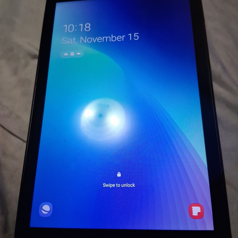 Samsung Tablet with Black Bezel and Blue Display